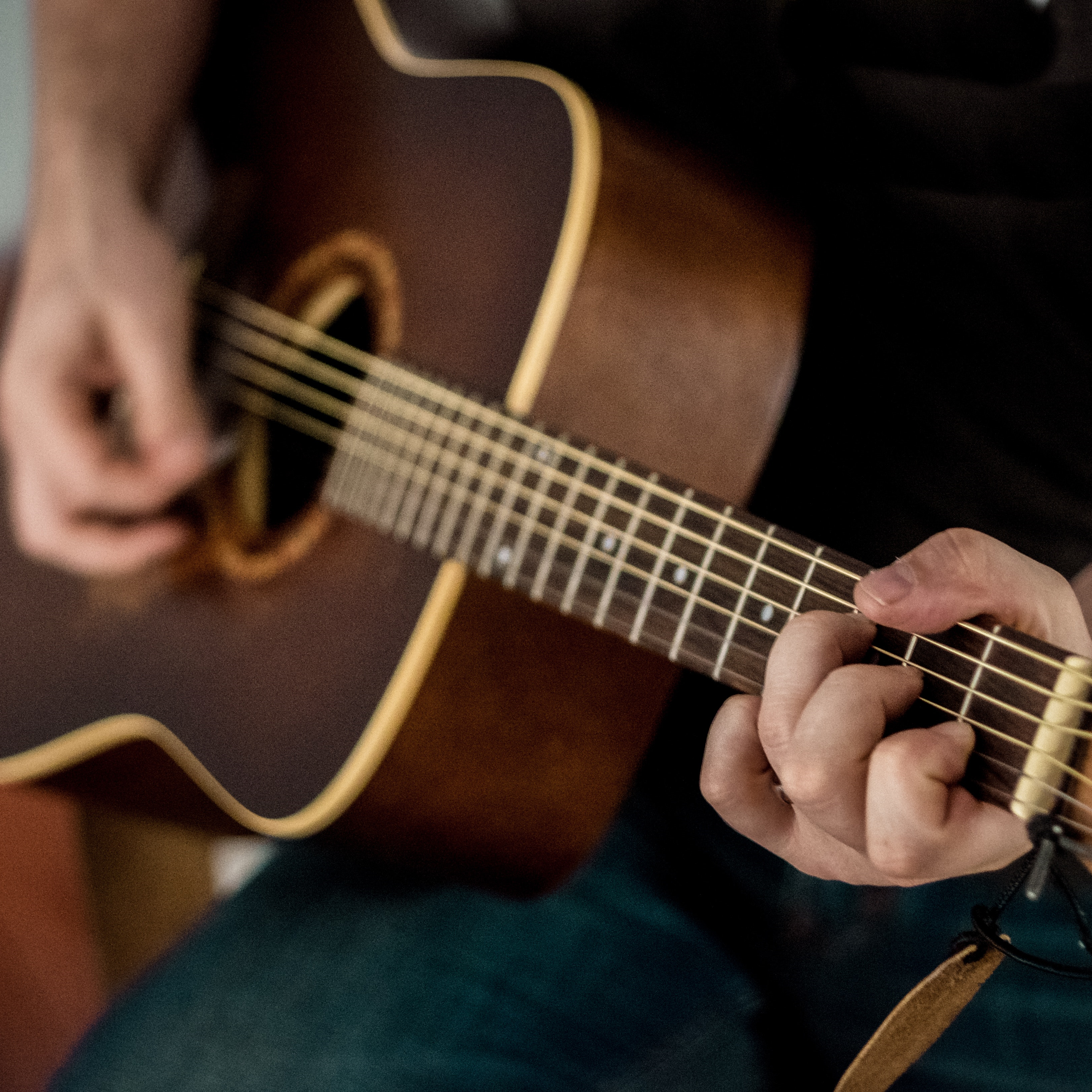 Man playing the guitar